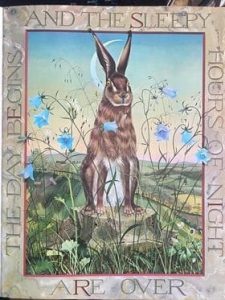 The same picture of the hare as before, showing the text 'The day begins and the sleepy hours of night are over.'